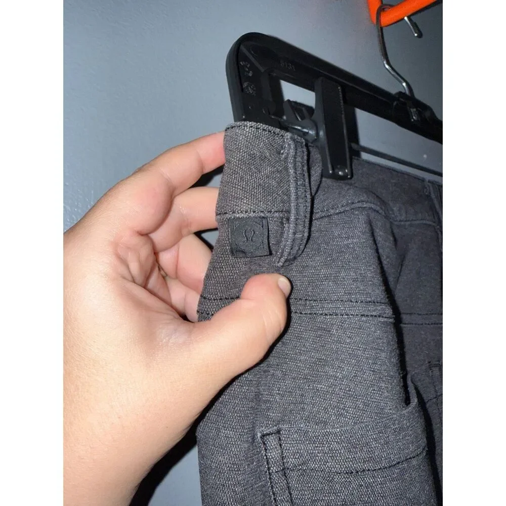 Men's Lululemon ABC Slim Tech Pants in Heathered Black Canvas | Size 30